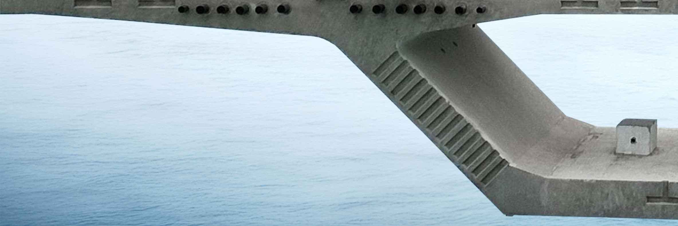 Photo of a bridge above the sea